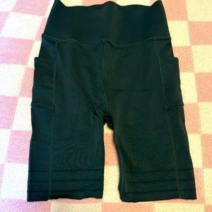 Forest green biker shorts by Fabletics